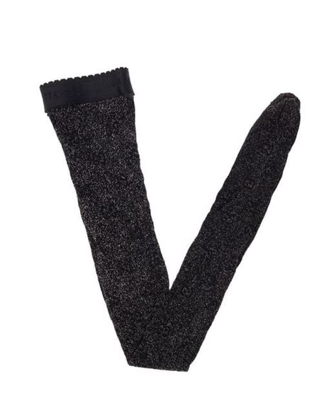 GG knit tights in black and silver .